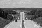 С 2020 года на стройплощадке Восточного обхода Новосибирска возвели новые дороги, развязки и путепроводы. В 2022 году, чтобы улучшить транспортную доступность, раньше срока запустили движение на участке длиной 1,7 км. Он находится в пределах транспортной развязки, где пересекаются пути с автодорогой Новосибирск — Ленинск-Кузнецкий. Фото: Андрей Заржецкий